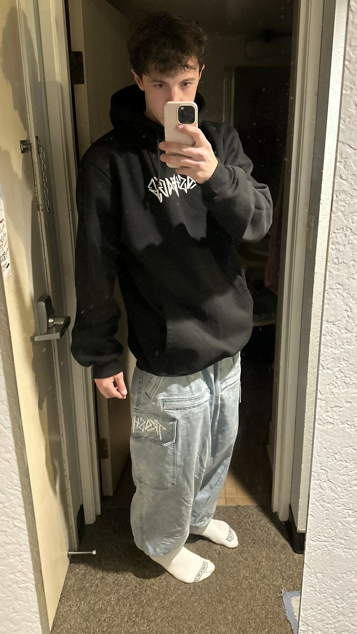 Mirror selfie in light denim Trashbags snow pants