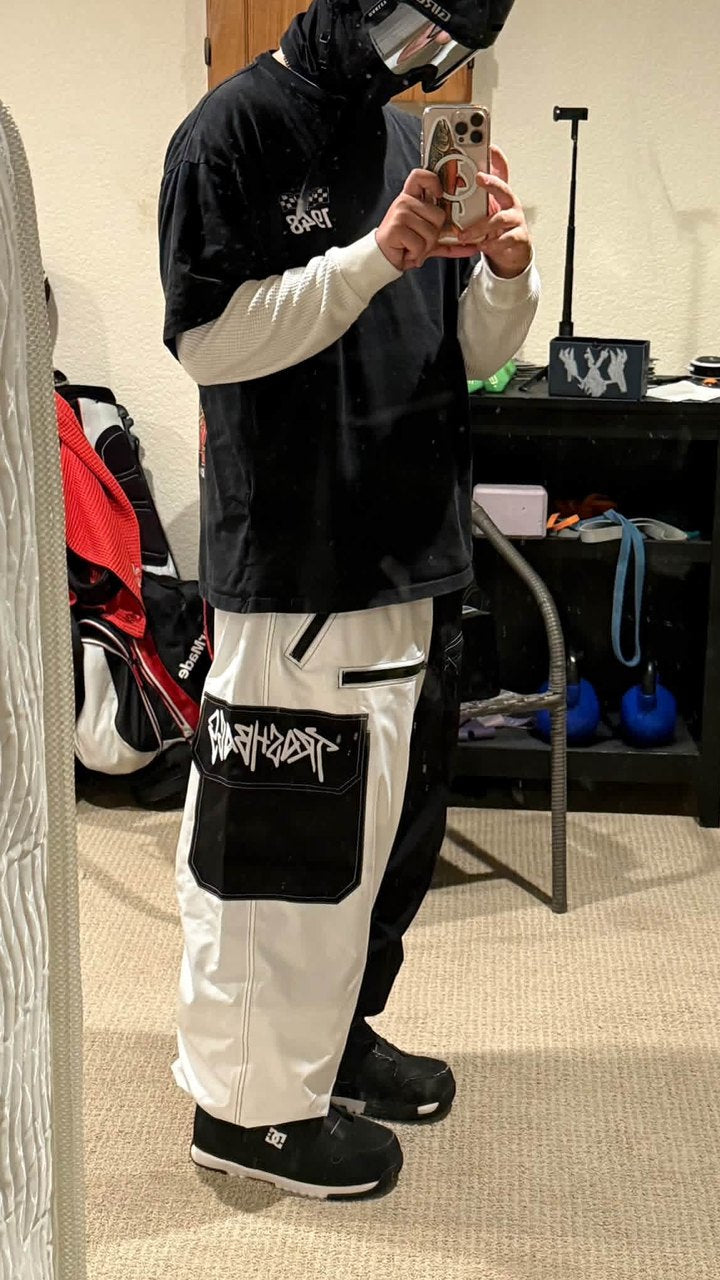 Mirror selfie in white Trashbags snow pants